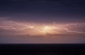 Yellow horizontal lightning across the whole sky over the Black sea in Crimea