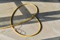 Yellow hose pipe on concrete cement floor. Royalty Free Stock Photo