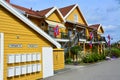 Yellow houses in Moss, Norway. flag Royalty Free Stock Photo