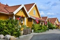 Yellow houses in Moss, Norway. flag Royalty Free Stock Photo