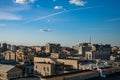 Yellow houses and roofs on the blue sky with light clouds. Birds-eye view the center of Moscow at sunset. Scape of the buildings