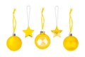 Yellow ÃÂ¡hristmas tree decorations set white background isolated closeup, golden hanging glass balls stars, New Year holiday