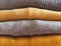 Yellow illuminated color and gray winter sweaters