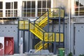 Yellow Industrial Stairs. The mezzanine industrial stairs access platform