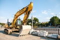 Istanbul, June 15, 2017: Yellow industrial Sumitomo excavator. Repair street works in the European part of the city near