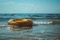 A yellow inflatable raft floating on the sea