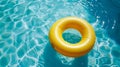 Yellow Inflatable Ring Floating in Pool