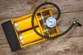 Yellow inflator with gauge Royalty Free Stock Photo