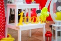 Yellow inscription - 1 year. Thematic first birthday party. Props and requisite for photo session. Decorations for children Royalty Free Stock Photo