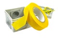 Yellow insulating tape and terminal box isolated on a white background