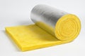Yellow insulation roll with silver foil for construction and energy efficiency in homes and buildings. concept of effective Royalty Free Stock Photo