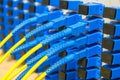 Yellow Internet wires are connected to the Optical Fiber Distribution Frame. Server patch panel. High-speed communication Royalty Free Stock Photo