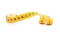 Yellow isolated metric measuring tape isolated on white background. Centimeter, close-up Royalty Free Stock Photo