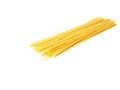 Yellow Italian spaghetti on a white background ready to be cooked.