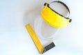 Yellow joiner`s ruler and face shield for home workshop