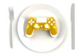 Yellow joystick on plate, knife and fork on white table background, Computer game competition, Gaming concept Royalty Free Stock Photo