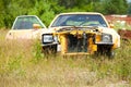 Yellow Junk Car in Field Royalty Free Stock Photo