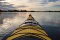 Yellow kayak on small Ploner lake, river Schwentine in Germany