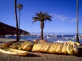 Yellow kayaks laying on beach