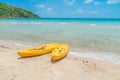 .Yellow kayaks on white sand beach Royalty Free Stock Photo