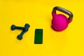 Yellow kettlebell space dumbbells phone lue isolated fitness fit, from lifting bodybuilding for bell and strength Royalty Free Stock Photo