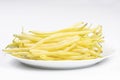 Yellow kidney beans on a white plate Royalty Free Stock Photo