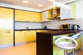 Yellow kitchen interior Royalty Free Stock Photo