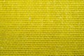 Yellow knitted fabric texture. woven material. textile close up background Royalty Free Stock Photo