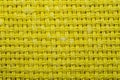 Yellow knitted fabric texture. woven material. textile close up background Royalty Free Stock Photo