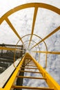 Yellow ladder to gas flare tower