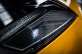Yellow Lamborghini headlight macro with Tecnica LED etching detail Royalty Free Stock Photo