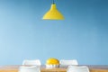 Yellow lamp over table