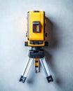 Yellow Laser Level Tripod Setup on White Background Royalty Free Stock Photo