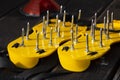 Yellow lawn aerator sandals with nails for lawn cultivation. Royalty Free Stock Photo