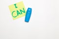 yellow leaflet with the words "I can", blue felt-tip pen, simple self-motivation