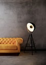 Yellow leather sofa and lamp on the lofe wall. room interior design with gray wall and wooden floor Royalty Free Stock Photo