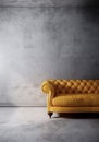 Yellow leather sofa on the lofe wall. room interior design with gray wall and wooden floor Royalty Free Stock Photo