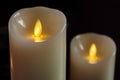 Yellow LED candles in the dark Royalty Free Stock Photo