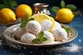 Yellow lemon balls desert with sugar powder in retro plate