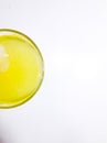 yellow lemon drink with round glass photographed from above Royalty Free Stock Photo