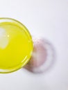 yellow lemon drink with round glass photographed from above Royalty Free Stock Photo