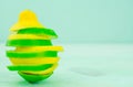 Yellow lemon and lime with fresh green mint on mint colour background Royalty Free Stock Photo