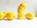 Yellow lemons and lemon peels Royalty Free Stock Photo