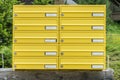 Yellow letterbox made of tin without name in a rural area, Austria Royalty Free Stock Photo