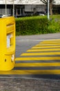 Yellow letterbox and zebra in Switzerland Royalty Free Stock Photo