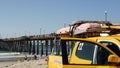 Yellow lifeguard car, beach near Los Angeles. Rescue Toyota pick up truck, lifesavers California USA