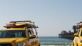 Yellow lifeguard car, ocean beach California USA. Rescue pick up truck, lifesavers vehicle. Royalty Free Stock Photo