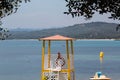 Yellow lifeguard tower on beach Royalty Free Stock Photo