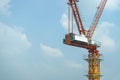 Yellow lifting crane Prepare to start In blue sky background Royalty Free Stock Photo