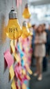 Yellow light bulb love office creative idea love concept inspiration teamwork sticky note brainstorming collaboration modern Royalty Free Stock Photo